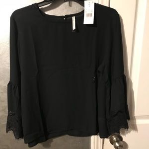 Black bell sleeve top